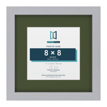 Silver 12 x 12 inch picture frame with a green mount for an 8 x 8 inch photo