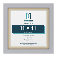 Silver 13 x 13 inch picture frame with an ivory mount for an 11 x 11 inch photo