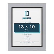 Silver 14 x 11 inch picture frame with a black mount for a 13 x 10 inch photo