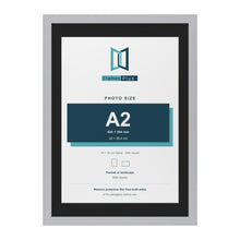 Silver 70 x 50 cm picture frame with a black mount for an A2 photo