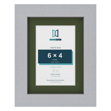 Silver 8 x 6 inch picture frame with a green mount for a 6 x 4 inch photo