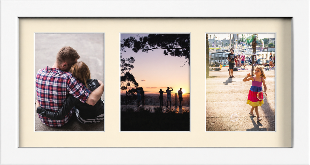 White multi-aperture frame, 3 Photos 7x5" with Ivory Mount displaying photographs