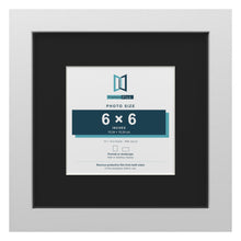 White 10 x 10 inch picture frame with a black mount for a 6 x 6 inch photo