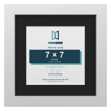 White 10 x 10 inch picture frame with a black mount for a 7 x 7 inch photo