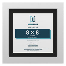 White 10 x 10 inch picture frame with a black mount for an 8 x 8 inch photo