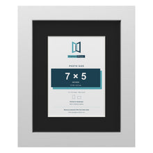 White 10 x 8 inch picture frame with a black mount for a 7 x 5 inch photo