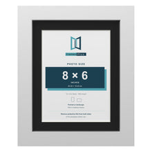 White 10 x 8 inch picture frame with a black mount for an 8 x 6 inch photo