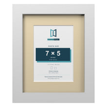 White 10 x 8 inch picture frame with an ivory mount for a 7 x 5 inch photo