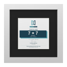 White 11 x 11 inch picture frame with a black mount for a 7 x 7 inch photo