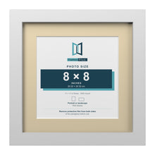White 11 x 11 inch picture frame with an ivory mount for an 8 x 8 inch photo