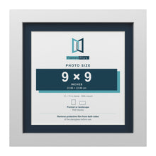 White 11 x 11 inch picture frame with a Pacific Blue mount for a 9 x 9 inch photo