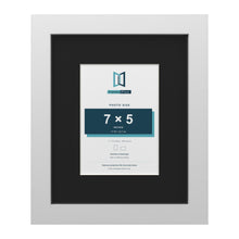 White 11 x 9 inch picture frame with a black mount for a 7 x 5 inch photo