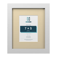 White 11 x 9 inch picture frame with an ivory mount for a 7 x 5 inch photo