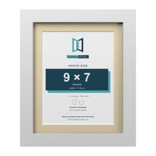 White 11 x 9 inch picture frame with an ivory mount for a 9 x 7 inch photo