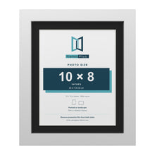White 12 x 10 inch picture frame with a black mount for a 10 x 8 inch photo