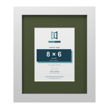 White 12 x 10 inch picture frame with a green mount for an 8 x 6 inch photo