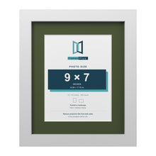 White 12 x 10 inch picture frame with a green mount for a 9 x 7 inch photo