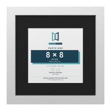 White 12 x 12 inch picture frame with a black mount for an 8 x 8 inch photo