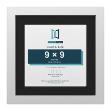 White 12 x 12 inch picture frame with a black mount for a 9 x 9 inch photo