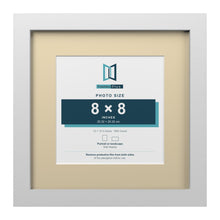 White 12 x 12 inch picture frame with an ivory mount for an 8 x 8 inch photo