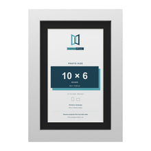 White 12 x 8 inch picture frame with a black mount for a 10 x 6 inch photo