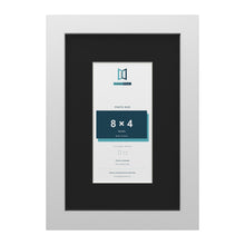 White 12 x 8 inch picture frame with a black mount for an 8 x 4 inch photo