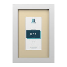 White 12 x 8 inch picture frame with an ivory mount for an 8 x 4 inch photo