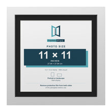 White 13 x 13 inch picture frame with a black mount for an 11 x 11 inch photo