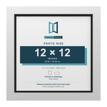 White 13 x 13 inch picture frame with a black mount for a 12 x 12 inch photo