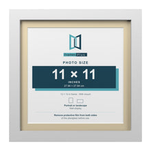 White 13 x 13 inch picture frame with an ivory mount for an 11 x 11 inch photo