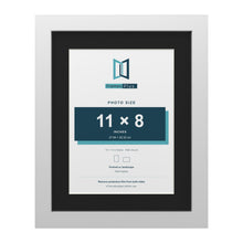 White 14 x 11 inch picture frame with a black mount for an 11 x 8 inch photo