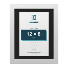 White 14 x 11 inch picture frame with a black mount for a 12 x 8 inch photo