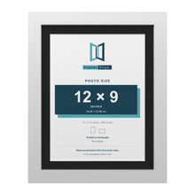 White 14 x 11 inch picture frame with a black mount for a 12 x 9 inch photo