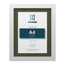 White 14 x 11 inch picture frame with a green mount for an A4 photo