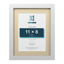 White 14 x 11 inch picture frame with an ivory mount for an 11 x 8 inch photo
