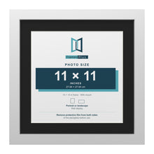 White 14 x 14 inch picture frame with a black mount for an 11 x 11 inch photo