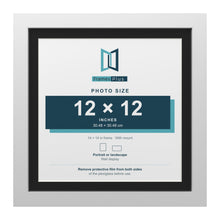 White 14 x 14 inch picture frame with a black mount for a 12 x 12 inch photo