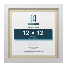 White 14 x 14 inch picture frame with an ivory mount for a 12 x 12 inch photo