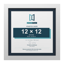 White 14 x 14 inch picture frame with a Pacific Blue mount for a 12 x 12 inch photo