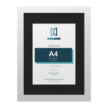 White 16 x 12 inch picture frame with a black mount for an A4 photo