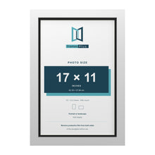 White 18 x 12 inch picture frame with a black mount for a 17 x 11 inch photo