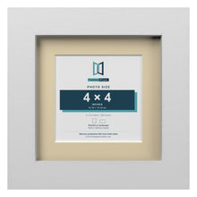 White 6 x 6 inch picture frame with an ivory mount for a 4 x 4 inch photo