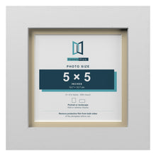 White 6 x 6 inch picture frame with an ivory mount for a 5 x 5 inch photo