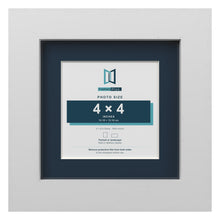 White 6 x 6 inch picture frame with a Pacific Blue mount for a 4 x 4 inch photo