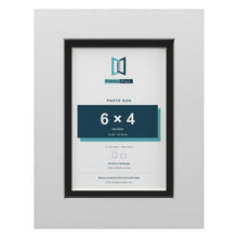 White 7 x 5 inch picture frame with a black mount for a 6 x 4 inch photo