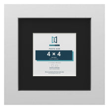White 7 x 7 inch picture frame with a black mount for a 4 x 4 inch photo