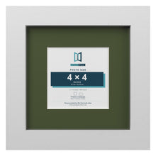 White 7 x 7 inch picture frame with a green mount for a 4 x 4 inch photo