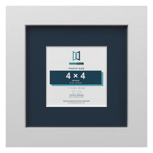 White 7 x 7 inch picture frame with a Pacific Blue mount for a 4 x 4 inch photo