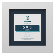 White 7 x 7 inch picture frame with a Pacific Blue mount for a 5 x 5 inch photo