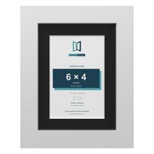 White 8 x 6 inch picture frame with a black mount for a 6 x 4 inch photo
